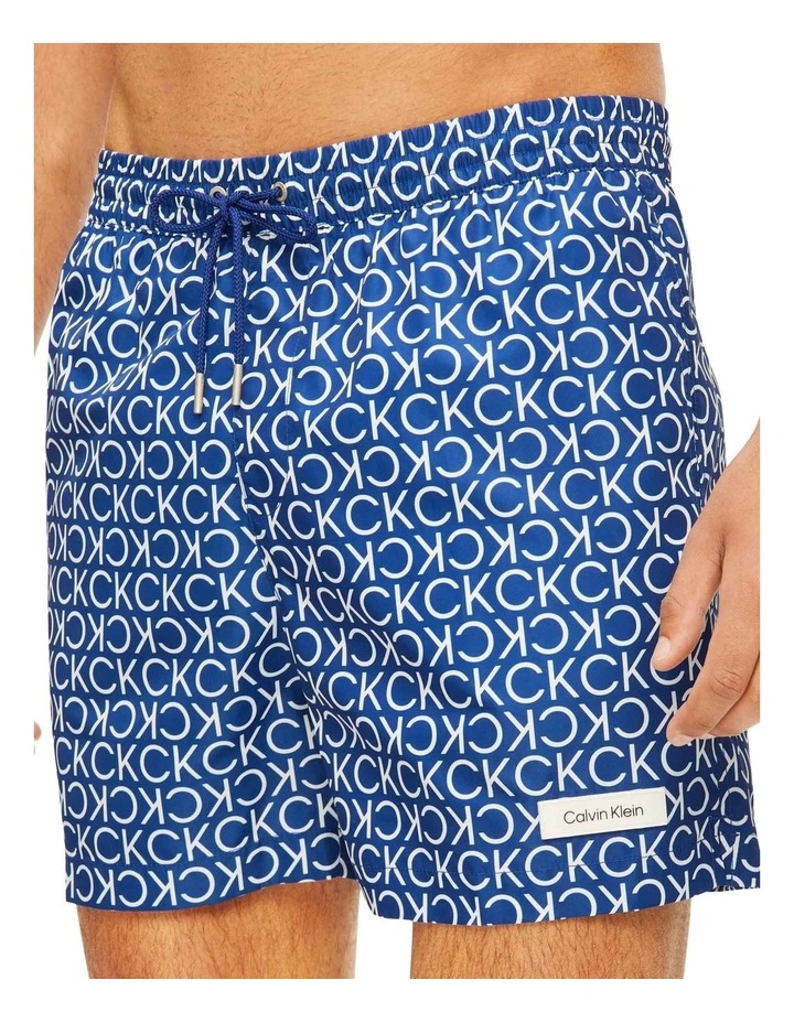 Core Solids Iconic Logo Medium Swimshort In Blue/White Calvin Klein Core Solids Iconic Logo Medium Swimshort In Blue/White -Calvin Klein Sales